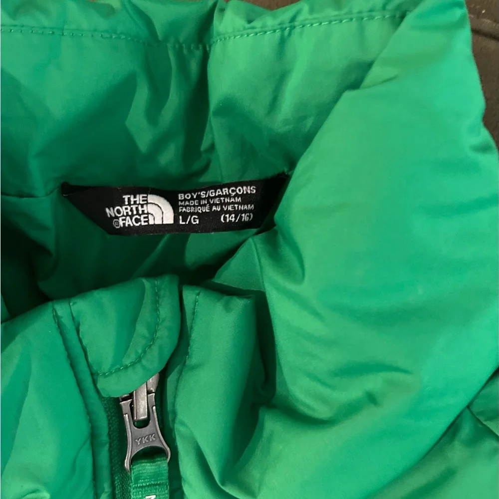 The North Face Vibrant Green Jacket for Spring and Fall Weather.